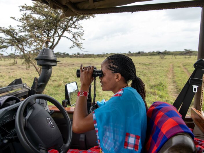 IN THE VERY MASCULINE WORLD OF SAFARI, A YOUNG MAASAI GUIDE TAKES THE LION'S SHARE