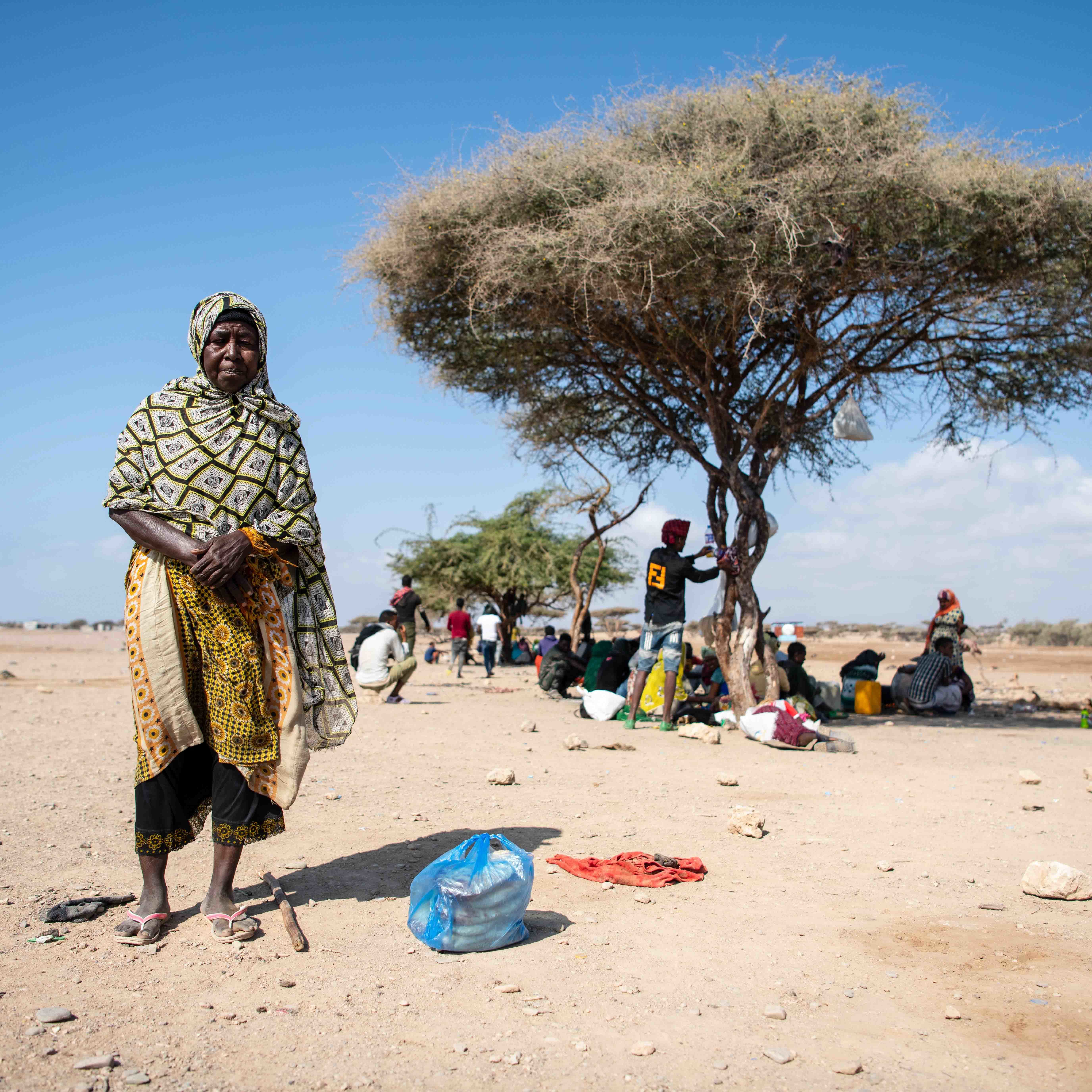 Portrait of Hawa, a local elderly selling bread to migrants in Fantahero