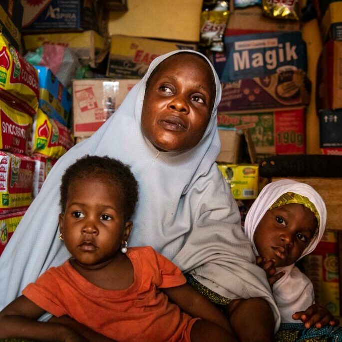 Lagos, Nigeria, june 2021. Portrait of Habi's familly in her shop
